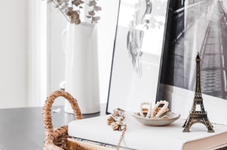 white and brown wicker basket on table