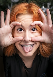 A comedian making a hilarious facial expression during a performance.