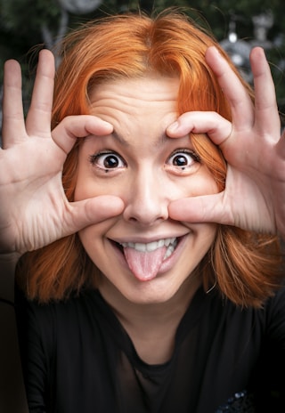 A comedian making a hilarious facial expression during a performance.