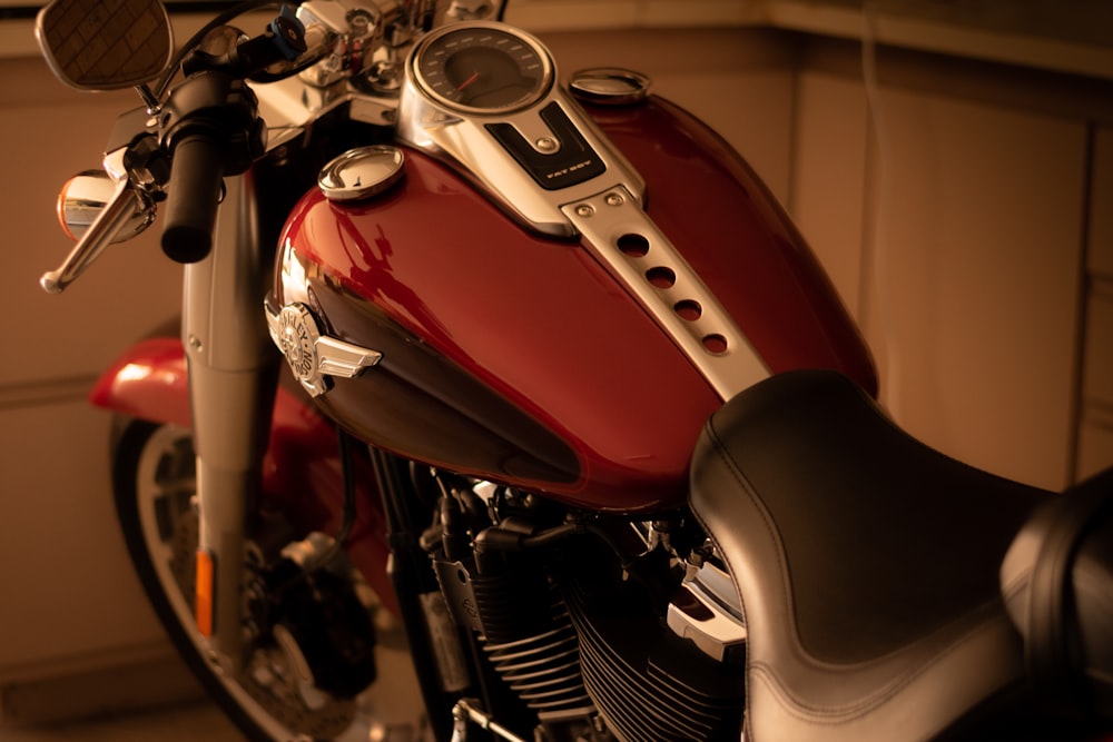red and black motorcycle in a room