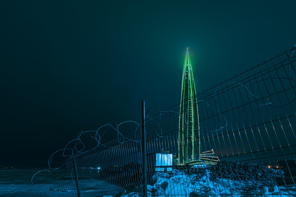 blue and white lights on bridge during night time