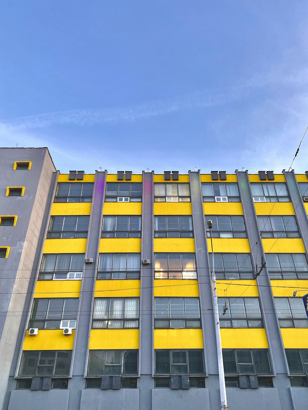 yellow and white concrete building