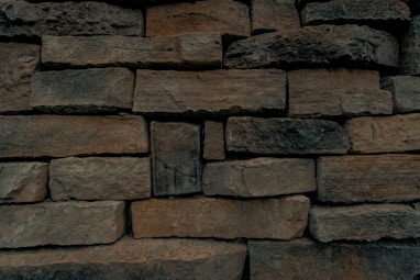 brown and gray brick wall