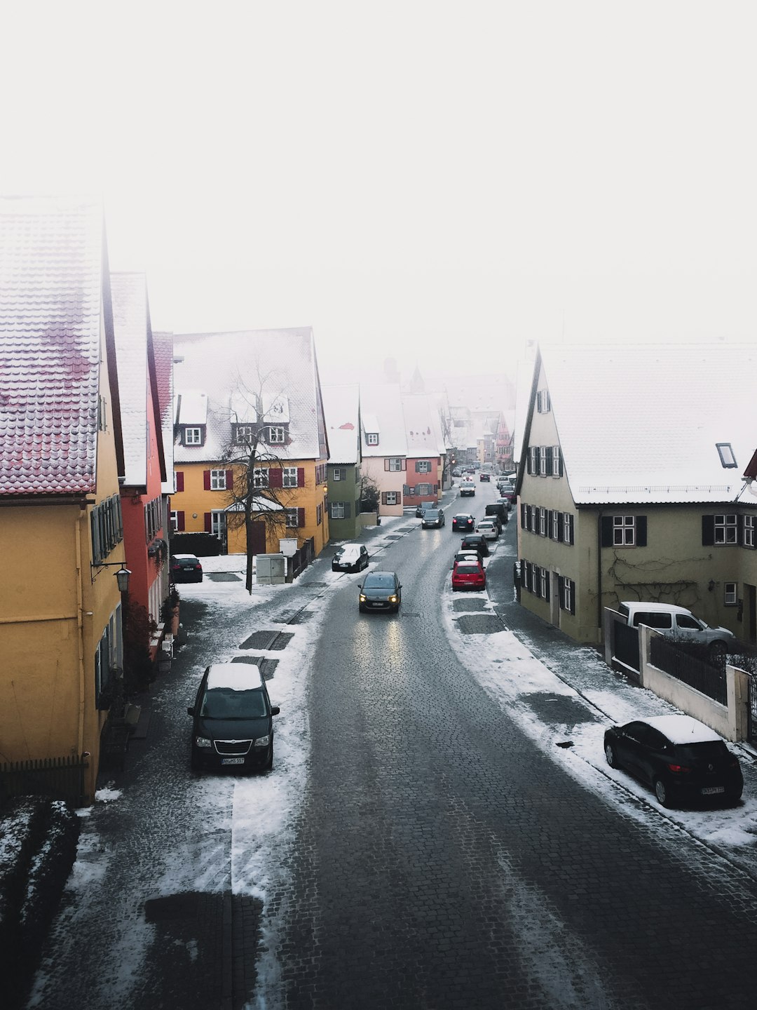 cars parked on side of the road during daytime