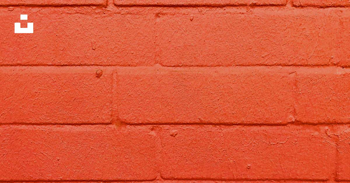 Oac Graphs Pared de ladrillo rojo durante el día - Foto gratuita en Unsplash