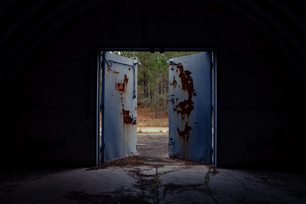 white wooden door with white steel door