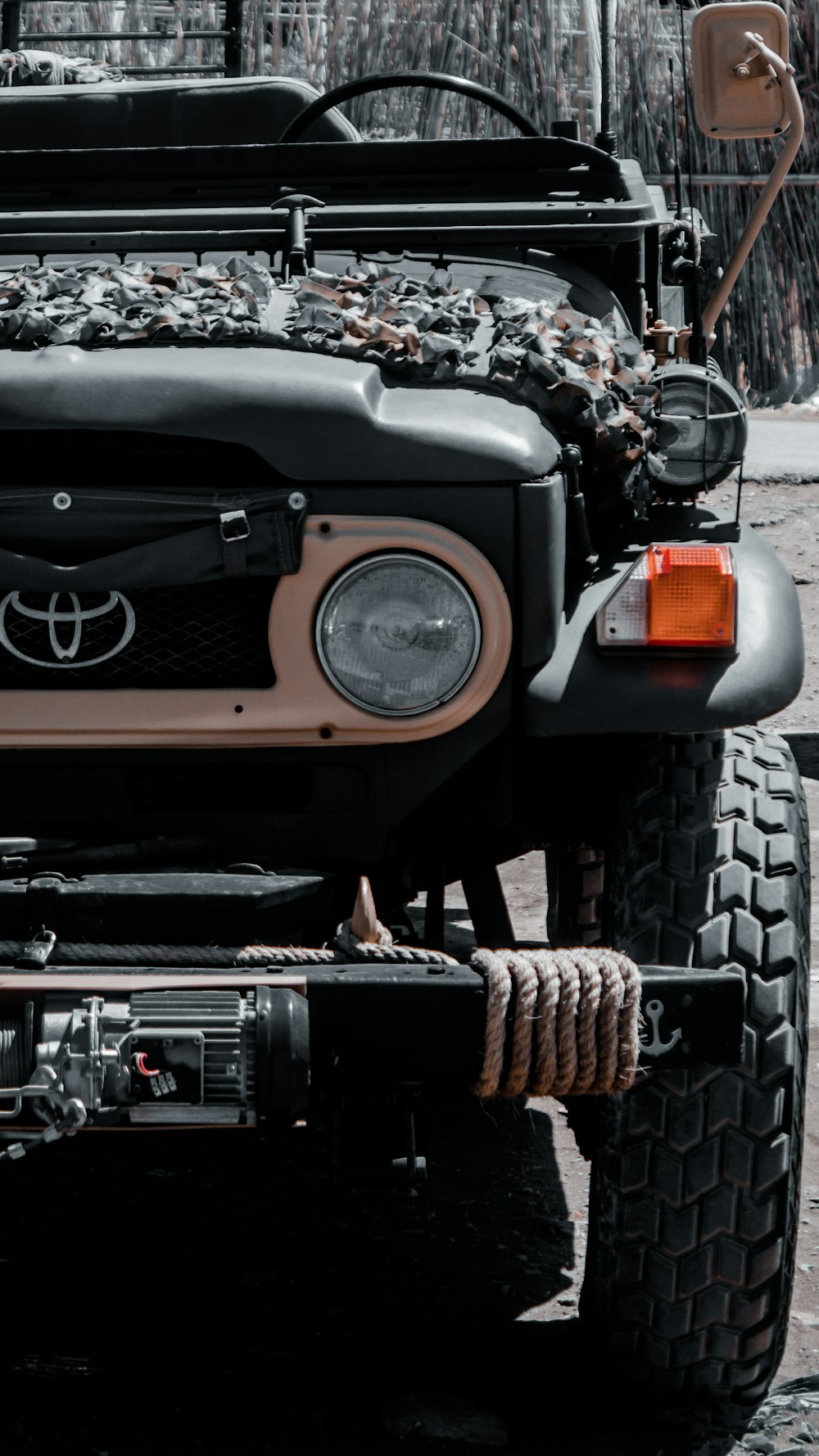 a black and white photo of a jeep