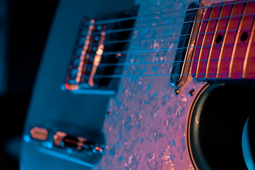 red and black electric guitar