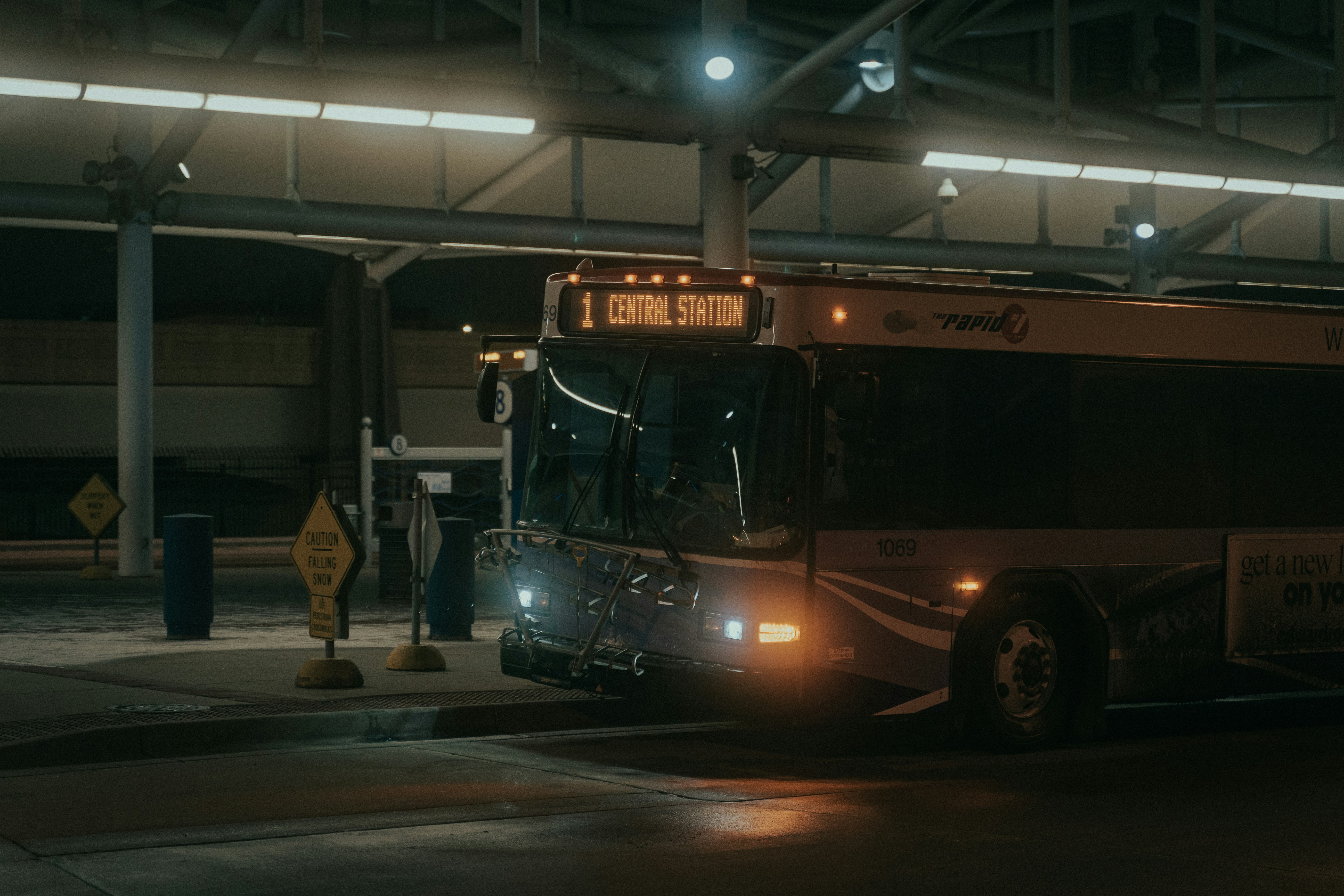 red double decker bus on road during night time