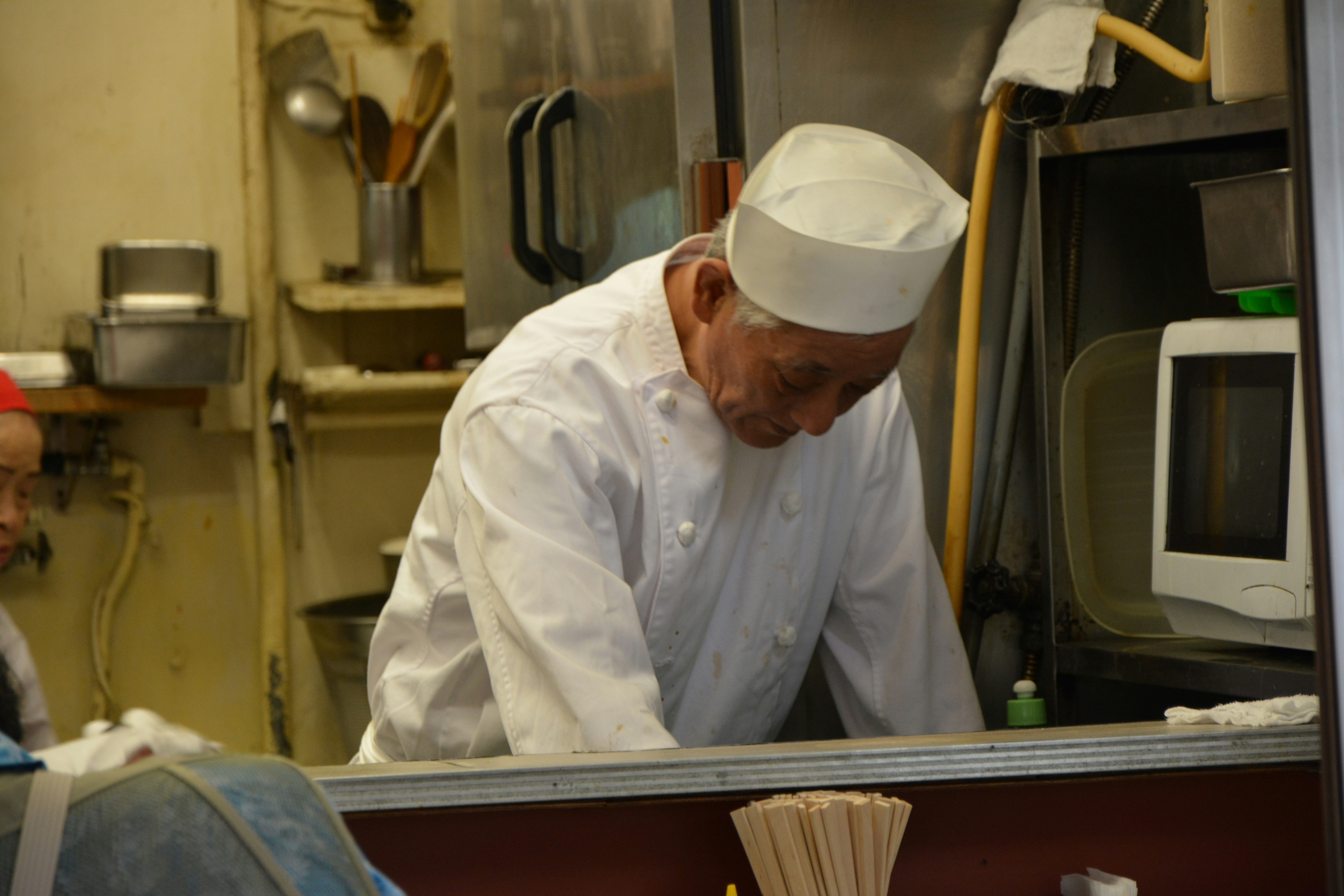 Japanese chef at sushi counter