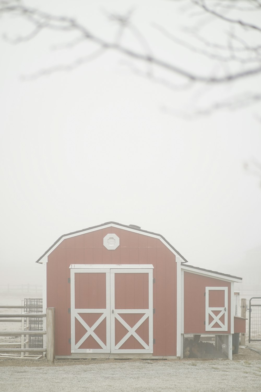 white and red wooden house under white sky