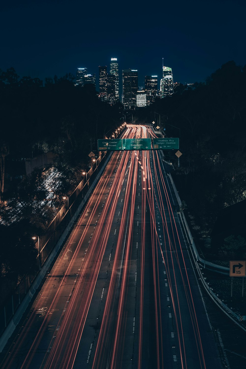 time lapse photography of cars on road during night time