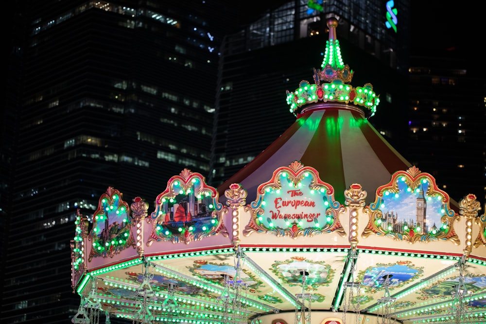 red and blue carousel with lights during night time