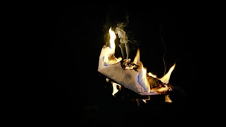 fire in black background with black background