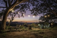 The outdoor terrace decorated with string lights at sunset.