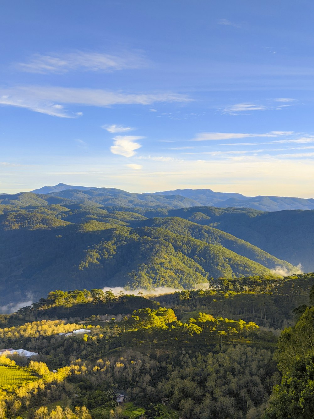 green mountains under blue sky during daytime