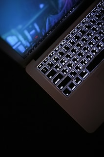 black and silver laptop computer