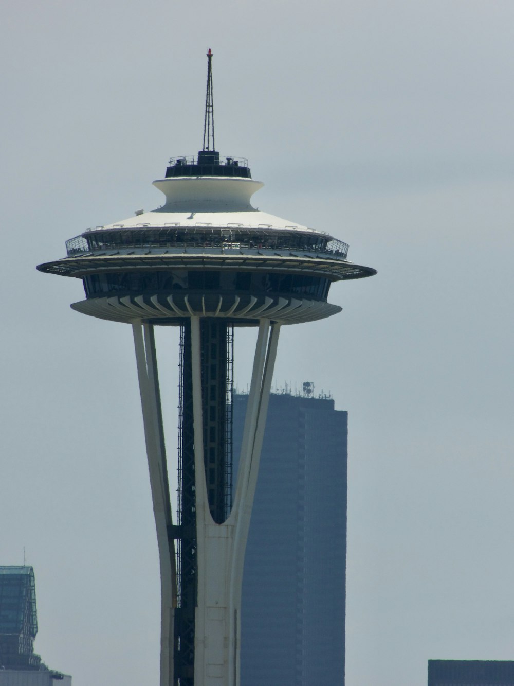 black and white tower under gray sky