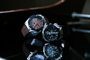 silver and black chronograph watch