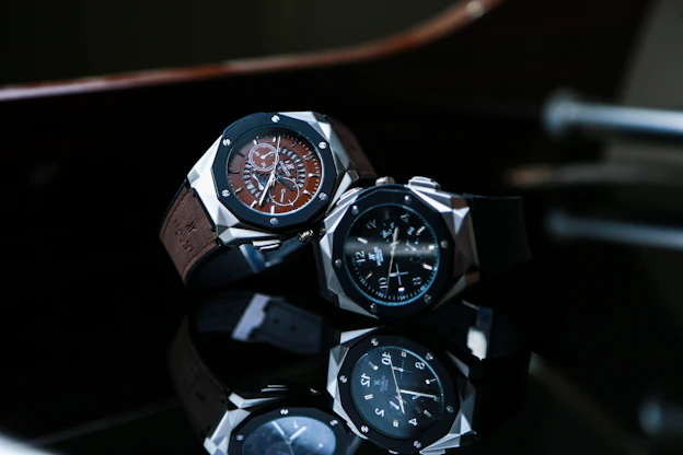 silver and black chronograph watch