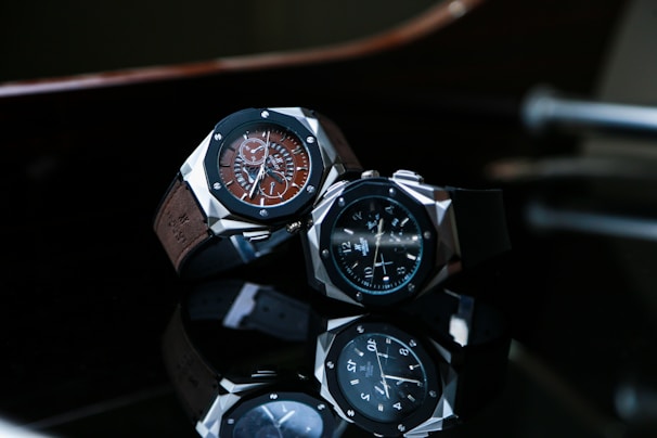 silver and black chronograph watch