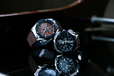 silver and black chronograph watch