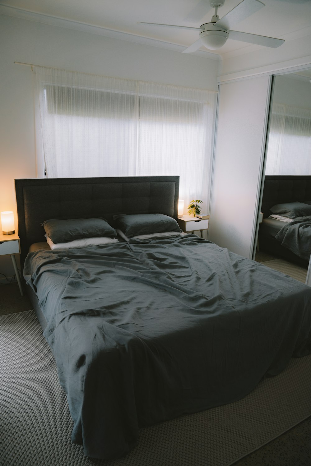 black bed linen on bed