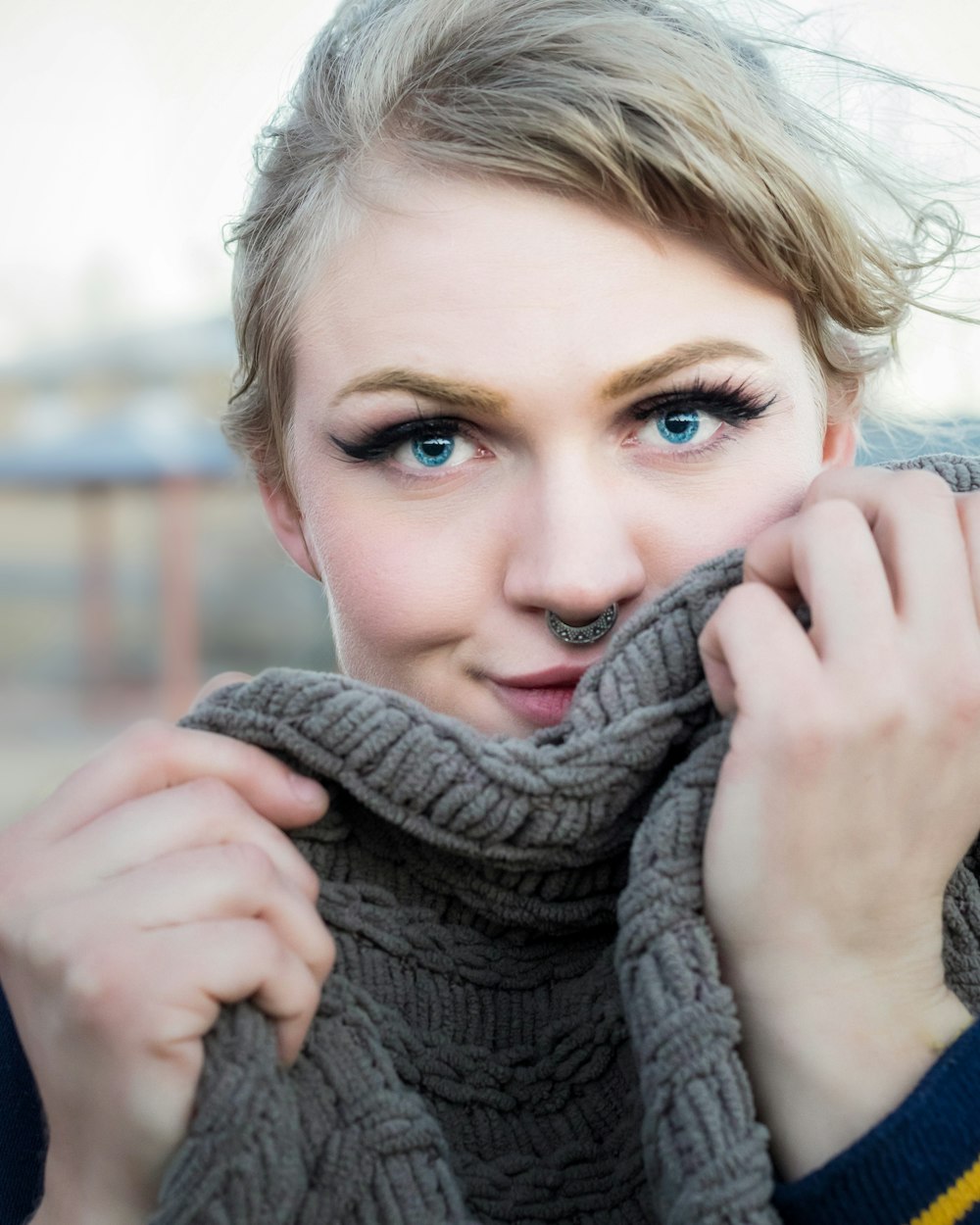 woman in gray knit sweater