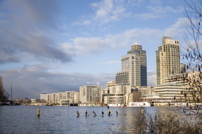 A stunning water view with highrise buildings reflecting the vibrant Vancouver skyline.