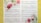 A sheet of piano music titled 'Longing for the past' composed by Nicoline van Goor. The sheet music is adorned with vibrant images of pink, red, and white flowers, which are positioned across the top and bottom of the page. The notation is clear and neatly arranged, indicating a piece composed on January 30, 2019.