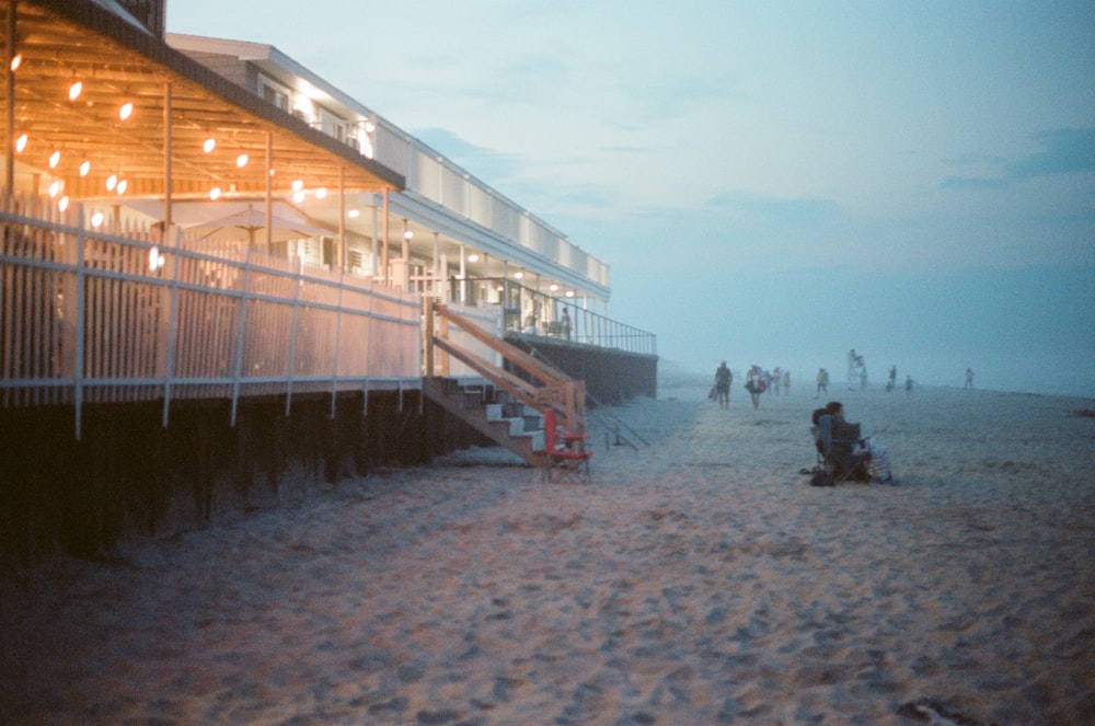 brown wooden dock on beach during daytime