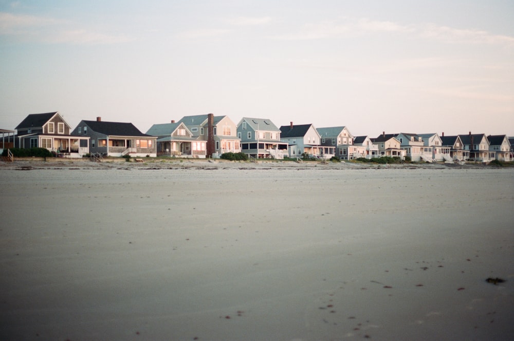 houses on beach during daytime