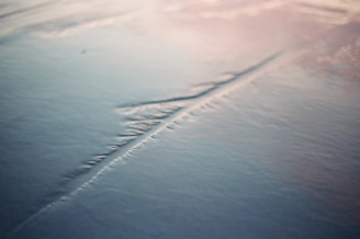 Soft, smooth texture of the pacifier surface reflecting gentle care in production.