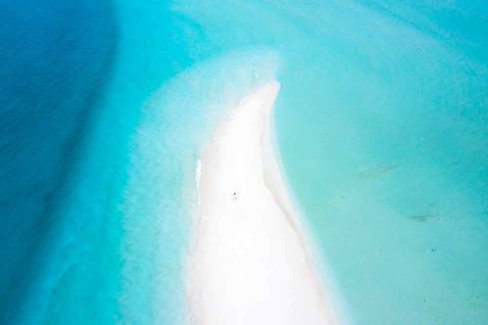 white and blue body of water