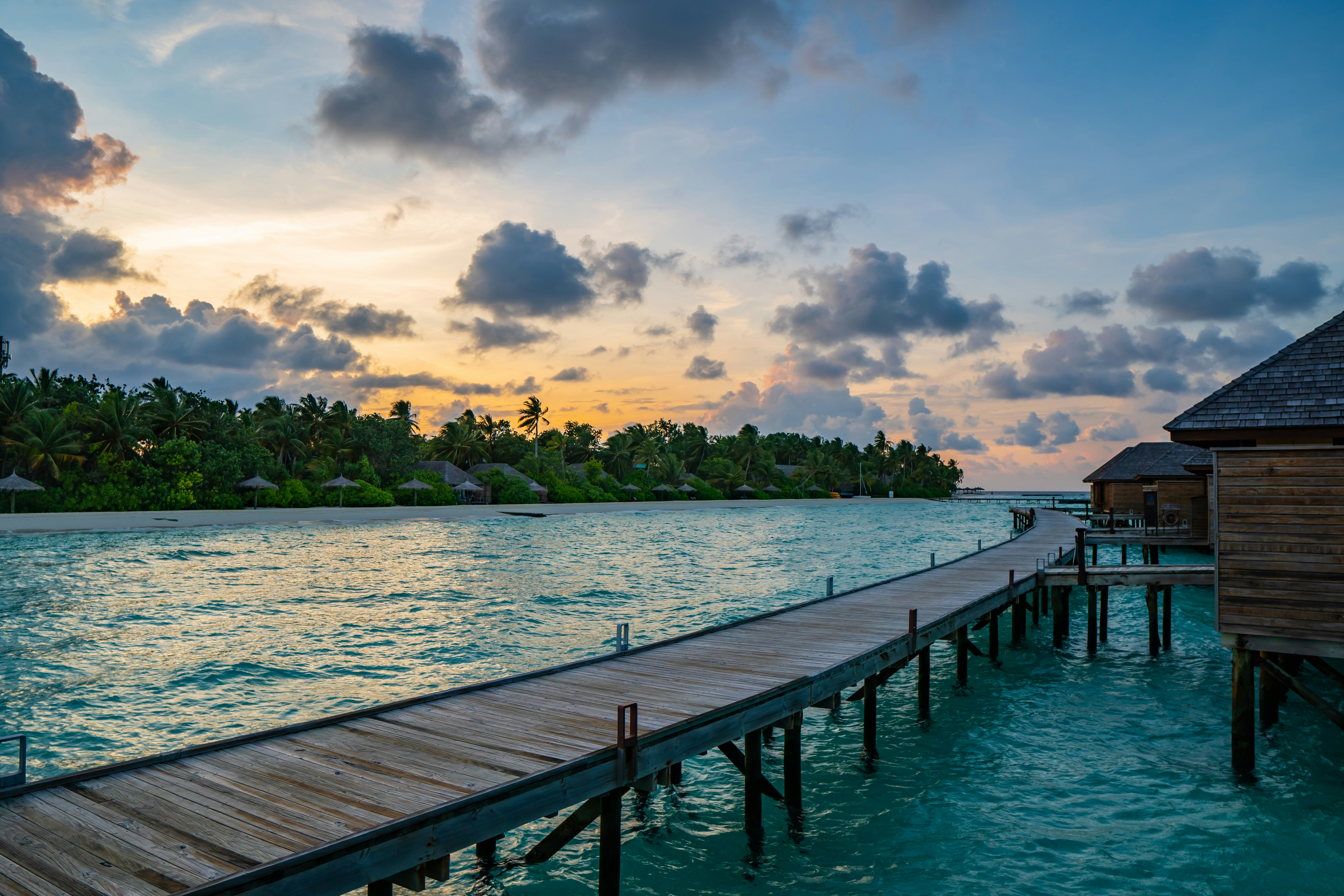 Pristine white sand beach in Maldives with turquoise waters