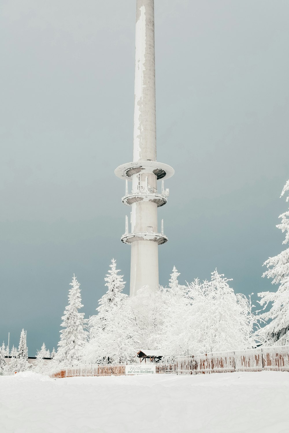 white concrete tower under blue sky during daytime