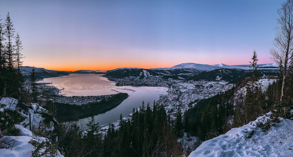 snow covered mountain during sunset