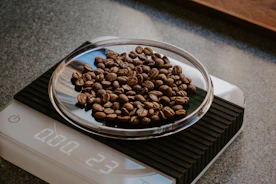 brown coffee beans on clear glass bowl