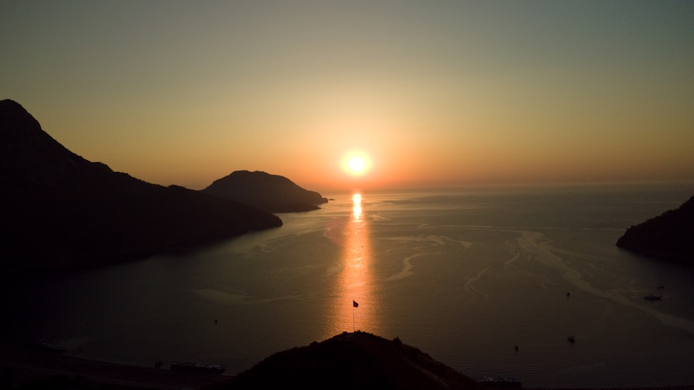 silhouette of mountain during sunset