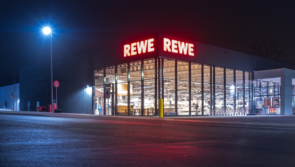 a retail store at night with the lights on