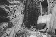 A tense moment as a player’s avatar cautiously navigates a crumbling ancient temple.