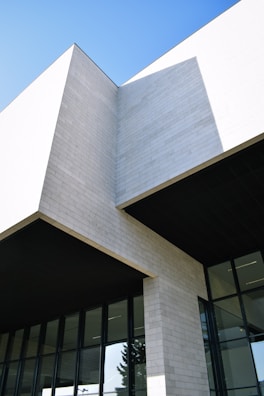 Exterior elevation of a building showcasing clean lines and durable materials under natural light.