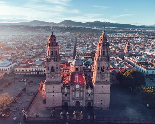 Brown and white concrete castle — Morelia, Mexico