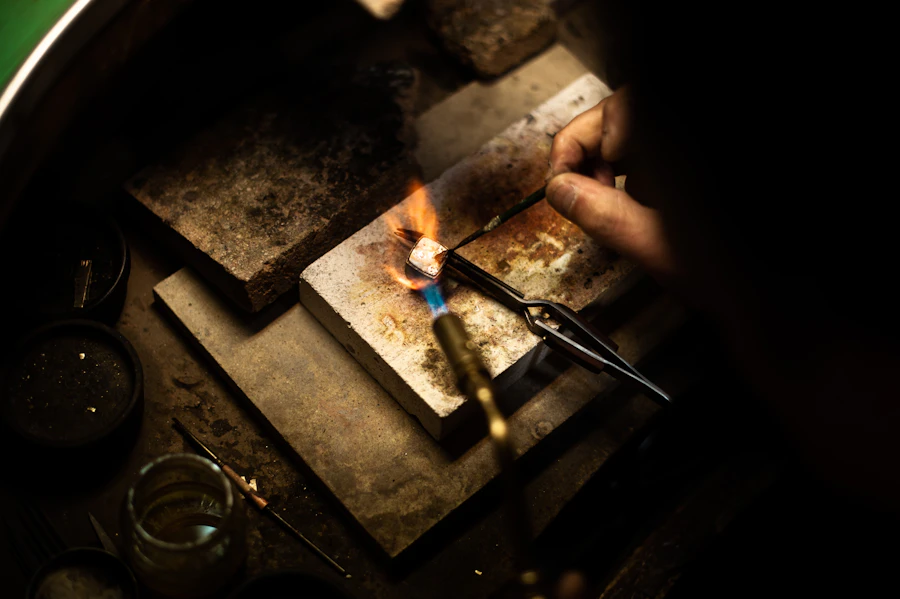 Lapidary cutting a gemstone