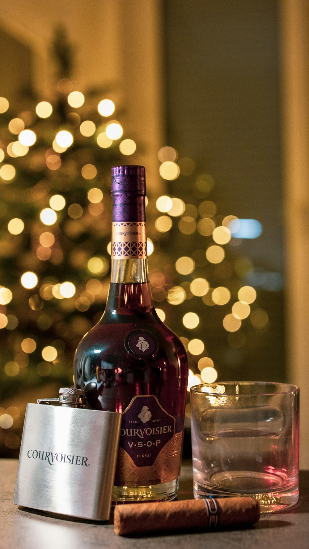 selective focus photography of wine bottle and drinking glass