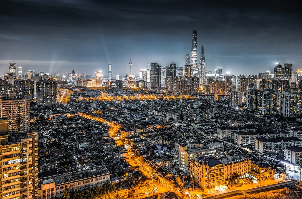 city skyline during night time