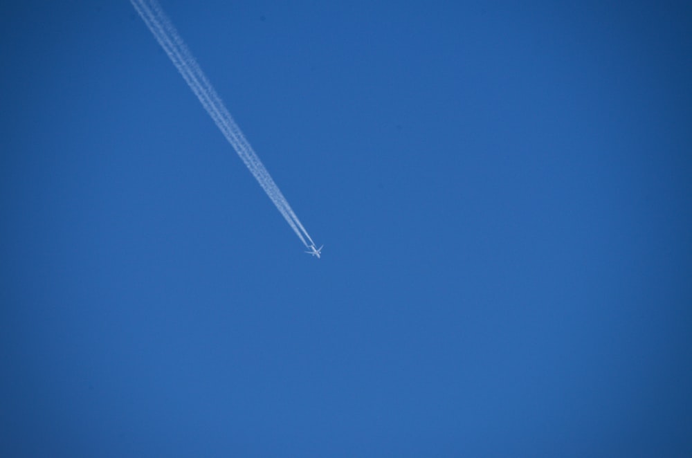 white plane in the sky