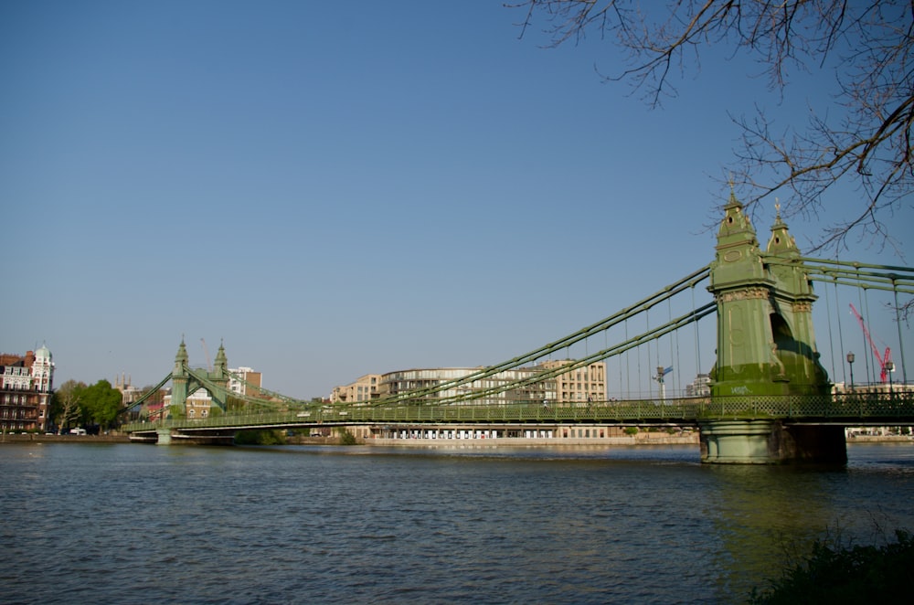 bridge over water under blue sky during daytime