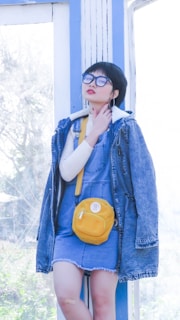 A casual outfit featuring a chic denim jacket and a flowing midi skirt, perfect for weekend outings.