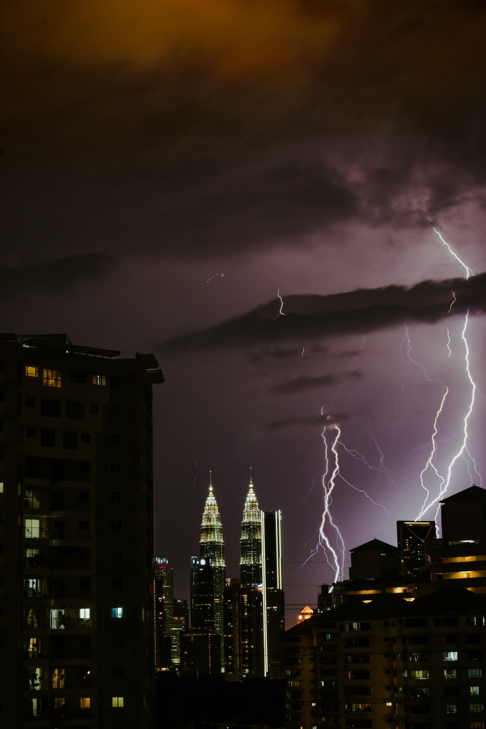 city buildings under gray sky